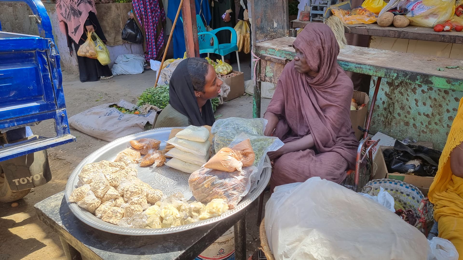 Chad. Selling sweets in Arkoum refugee camp